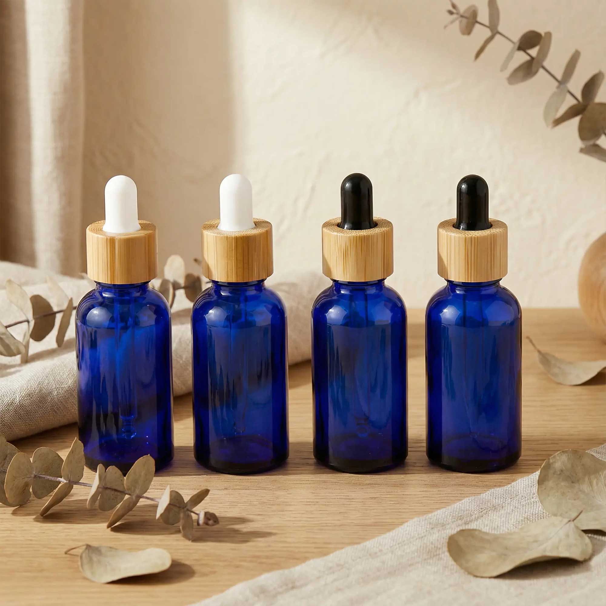 Plava staklena bocica sa bambus pipetom