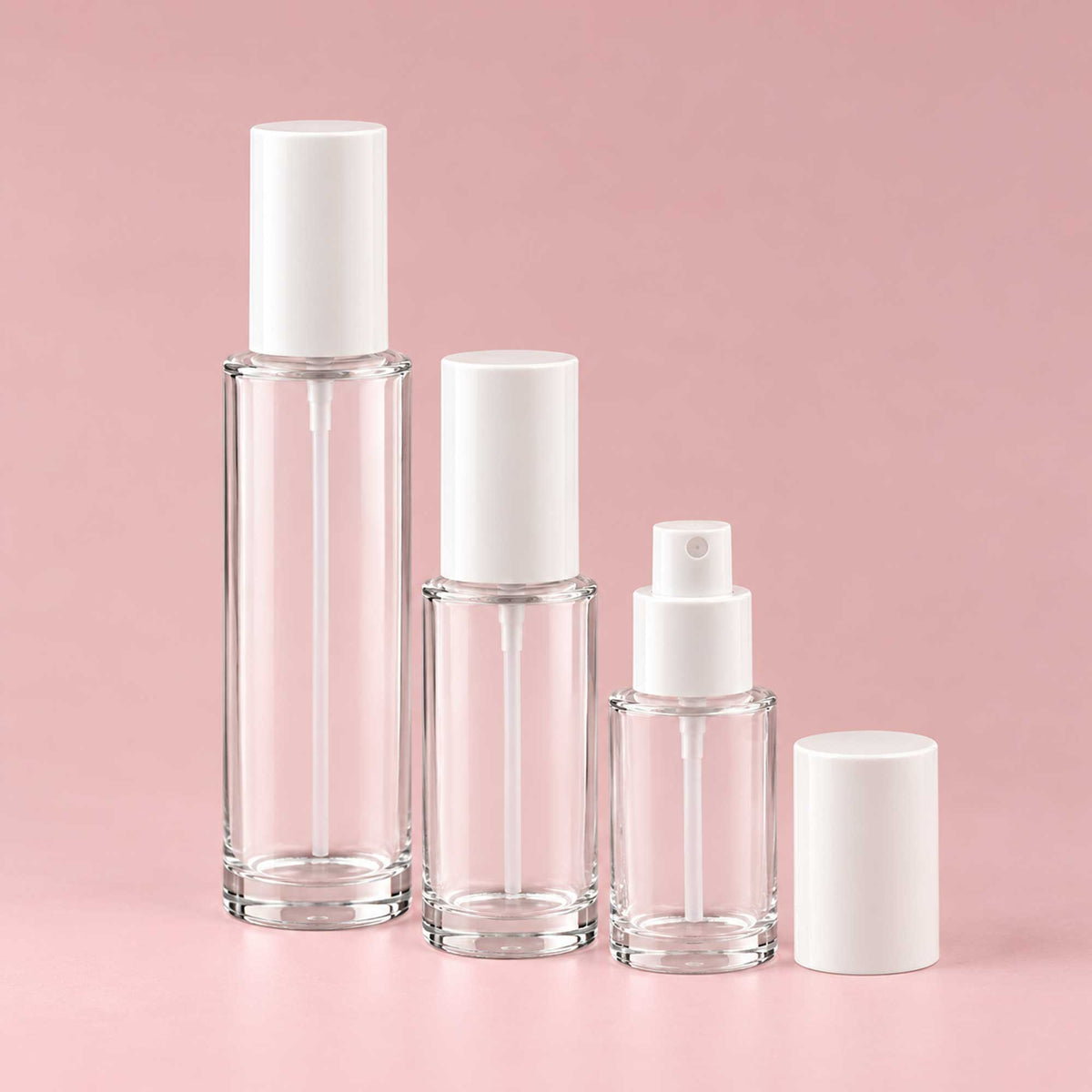 HERA staklena bočica 30-100ml, transparentna, sa belim aluminijumskim sprej raspršivačem - 428100/200/400 - 429910