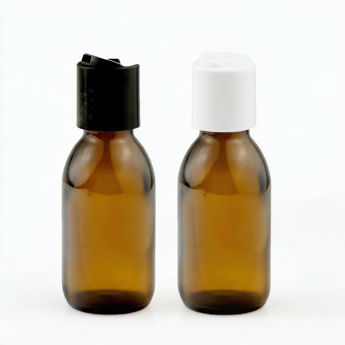 Dve braon staklene boce za sirup 100 ml sa crnim i belim disk top poklopcem, grlo 28 mm - 441180, 448310, 448300 | Bazika